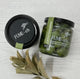 Luxury corporate gift box featuring an acacia serving board, wooden-handle cheese knife set, gourmet olives, and artisan chocolates, arranged in a black gift box with black ribbon.