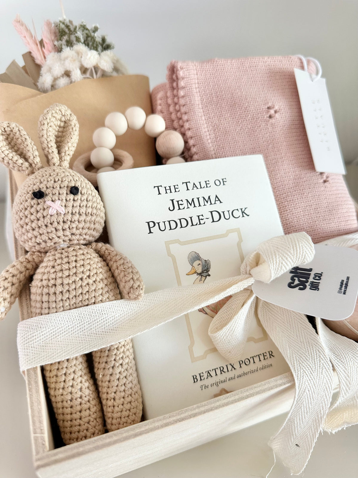 Baby and mama gifting plush bunny baby book blanket bath bomb spa